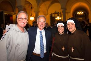 L to R: Father Bob Lombardo of the Franciscan Friars of the Renewal, Jeff Karls and Sisters Alicia and Kate from the Franciscans of the Eucharist of Chicago at the Institute on Religious Life Mystical Rose Gala in November 2019. L to R: Father Bob Lombardo of the Franciscan Friars of the Renewal, Jeff Karls and Sisters Alicia and Kate from the Franciscans of the Eucharist of Chicago at the Institute on Religious Life Mystical Rose Gala in November 2019.