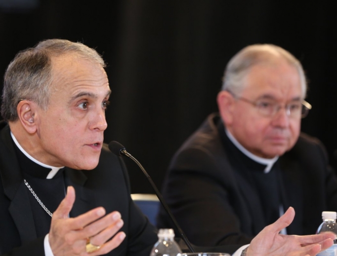 Archbishop Daniel DiNardo of Galveston-Houston and Archbishop Jose Gomez of Los Angeles, the president and vice president of the bishops' conference respectively. Archbishop Daniel DiNardo of Galveston-Houston and Archbishop Jose Gomez of Los Angeles, the president and vice president of the bishops' conference respectively.