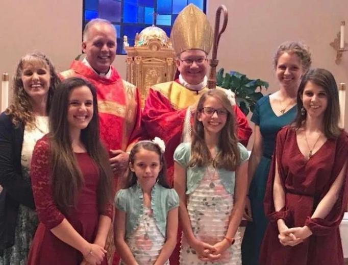 Deacon Drake McCalister, his family, and Bishop Jeffrey Montforton. Deacon Drake McCalister, his family, and Bishop Jeffrey Montforton.