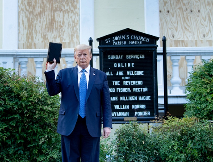 President Donald Trump holds a Bible while visiting St. John's Episcopal Church across from the White House on June 1, 2020, in Washington, DC. President Donald Trump holds a Bible while visiting St. John's Episcopal Church across from the White House on June 1, 2020, in Washington, DC.