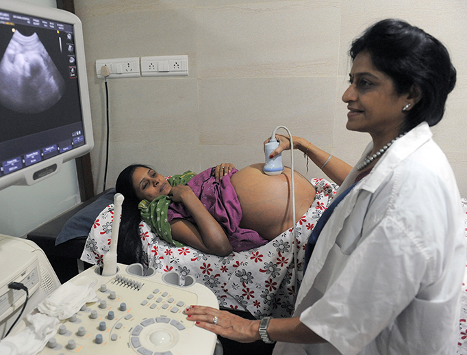 Dr. Nayna Patel (R) conducts an ultrasound at Kaival Hospital in Anand, India, Oct. 31, 2011.
Dr. Nayna Patel (R) conducts an ultrasound at Kaival Hospital in Anand, India, Oct. 31, 2011.