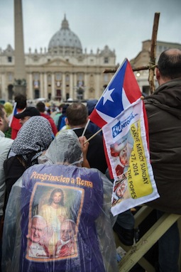 Pilgrims attend the April 27 canonizations of Popes John Paul II and John XXIII in St. Peter’s Square. Pilgrims attend the April 27 canonizations of Popes John Paul II and John XXIII in St. Peter’s Square.