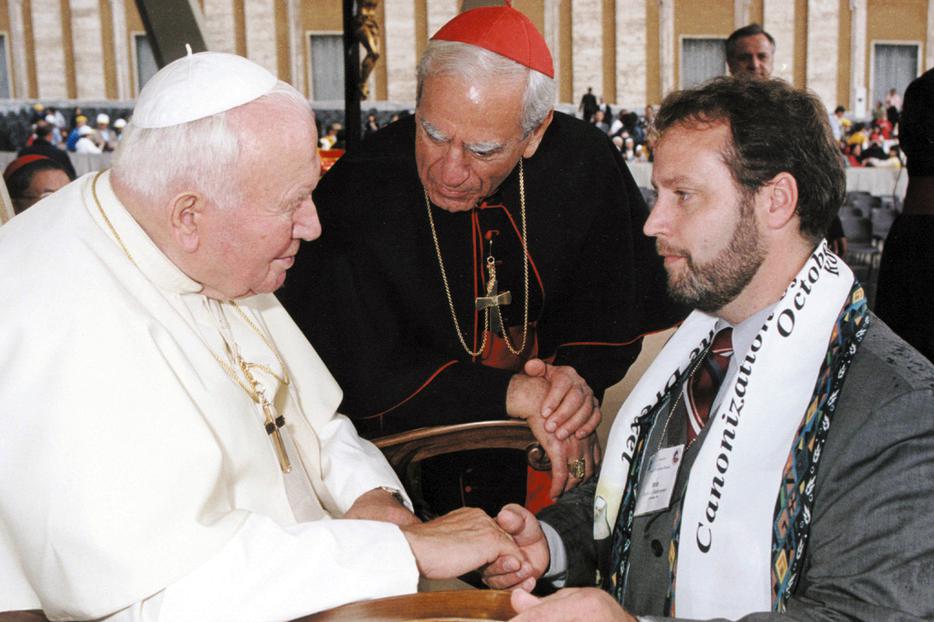 Bob Gutherman and Cardinal Anthony Bevilacqua greet Pope St. John Paul II at St. Katharine Drexel's canonization ceremony in 2000. (Source: Bob Gutherman) Bob Gutherman and Cardinal Anthony Bevilacqua greet Pope St. John Paul II at St. Katharine Drexel's canonization ceremony in 2000. (Source: Bob Gutherman)