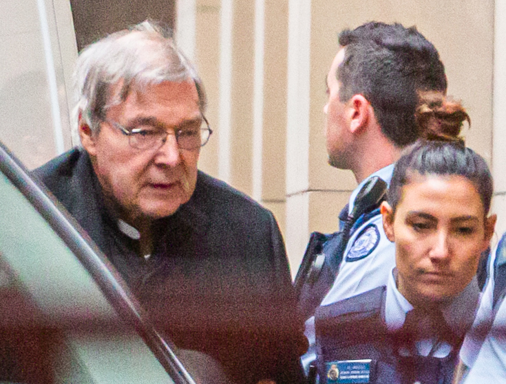 Cardinal George Pell is escorted into the Supreme Court of Victoria in Melbourne for his appeal hearing on Thursday Cardinal George Pell is escorted into the Supreme Court of Victoria in Melbourne for his appeal hearing on Thursday