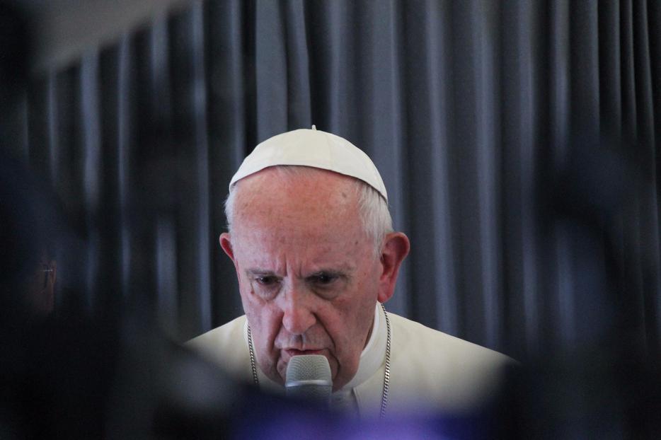 Pope Francis speaks with journalists May 13 on the papal flight back to Rome after his two-day visit to Fatima, Portugal. Pope Francis speaks with journalists May 13 on the papal flight back to Rome after his two-day visit to Fatima, Portugal.