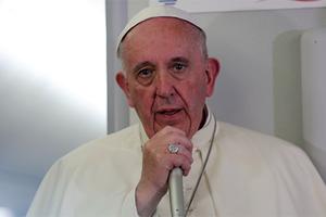 Pope Francis aboard the papal flight from Mexico to Rome, Italy on February 17, 2016. Pope Francis aboard the papal flight from Mexico to Rome, Italy on February 17, 2016.