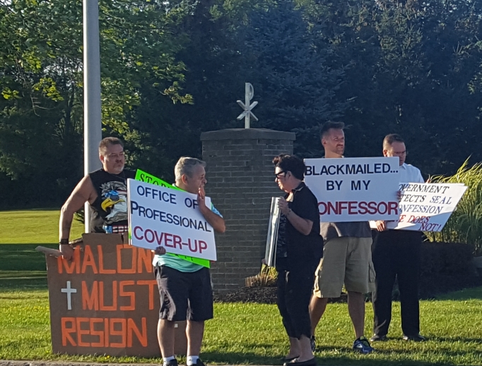Above, laity participate in a lay-organized protest outside Christ the King Seminary in East Aurora, New York, Aug. 28. Above, laity participate in a lay-organized protest outside Christ the King Seminary in East Aurora, New York, Aug. 28.