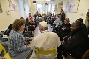 Pope Francis visits with residents of CasAmica, a home for the sick, in a Roman suburb Dec. 7. Pope Francis visits with residents of CasAmica, a home for the sick, in a Roman suburb Dec. 7.