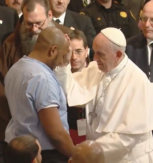 Pope Francis blesses a prisoner at the Curran-Fromhold Correctional Facility in Philadelphia on Sept. 27. Pope Francis blesses a prisoner at the Curran-Fromhold Correctional Facility in Philadelphia on Sept. 27.