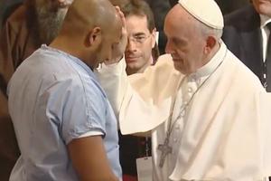 Pope Francis blesses a prisoner at the Curran-Fromhold Correctional Facility in Philadelphia on Sept. 27. Pope Francis blesses a prisoner at the Curran-Fromhold Correctional Facility in Philadelphia on Sept. 27.