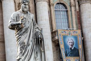 Official canonization portrait of John Henry Newman hangs in St. Peter's Square on Oct. 10. Official canonization portrait of John Henry Newman hangs in St. Peter's Square on Oct. 10.