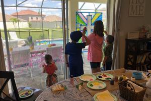 Across the country, families and individuals are making the world a bit brighter through art and music. Above, the Bauer kids create stained glass. Across the country, families and individuals are making the world a bit brighter through art and music. Above, the Bauer kids create stained glass.