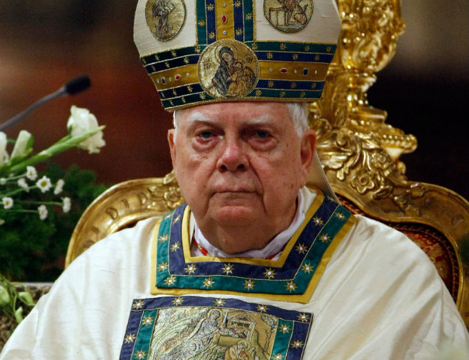 Cardinal Bernard Law celebrates Mass during a ceremony for Our Lady of the Snows in the Basilica of St. Mary Major in Rome in 2010. Cardinal Law, who resigned in disgrace for his role in the clergy sex-abuse scandal in Boston, died Wednesday. Below, Cardinal Law, answers a question from attorney Mitchell Garabedian, in Boston's Suffolk Superior Court Aug. 2, 2002, regarding his knowledge and handling of the Father John Geoghan child sex-abuse case. Cardinal Bernard Law celebrates Mass during a ceremony for Our Lady of the Snows in the Basilica of St. Mary Major in Rome in 2010. Cardinal Law, who resigned in disgrace for his role in the clergy sex-abuse scandal in Boston, died Wednesday. Below, Cardinal Law, answers a question from attorney Mitchell Garabedian, in Boston's Suffolk Superior Court Aug. 2, 2002, regarding his knowledge and handling of the Father John Geoghan child sex-abuse case.