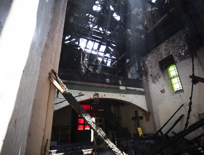 Mission San Gabriel, which was founded in 1771 by St. Junípero Serra, was devastated by fire July 11. Auxiliary Bishop David O’Connell of the San Gabriel Pastoral Region of the Archdiocese of Los Angeles was on hand to survey the fire-caused damage. Mission San Gabriel, which was founded in 1771 by St. Junípero Serra, was devastated by fire July 11. Auxiliary Bishop David O’Connell of the San Gabriel Pastoral Region of the Archdiocese of Los Angeles was on hand to survey the fire-caused damage.