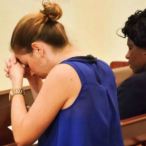 A woman prays at the Orlando prayer vigil at St. James Cathedral, June 13. A woman prays at the Orlando prayer vigil at St. James Cathedral, June 13.