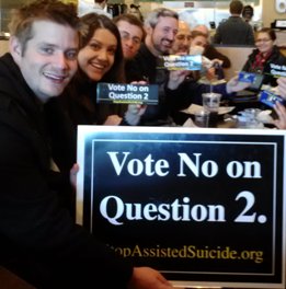 Some members of a street team gather after a "No on Question 2" outreach in Boston. Some members of a street team gather after a "No on Question 2" outreach in Boston.