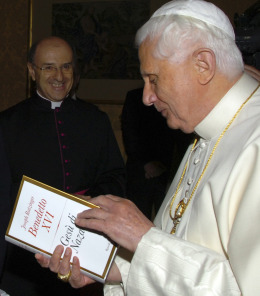 Pope Benedict peruses a newly published copy of Jesus of Nazareth. Pope Benedict peruses a newly published copy of Jesus of Nazareth.