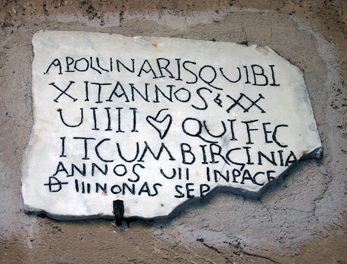 Ancient Christian funerary plaque in Santa Maria degli Angeli, Rome, Italy, for a man named Apollinaris, who lived 29 years, 7 of which with his wife Virginia. Ancient Christian funerary plaque in Santa Maria degli Angeli, Rome, Italy, for a man named Apollinaris, who lived 29 years, 7 of which with his wife Virginia.
