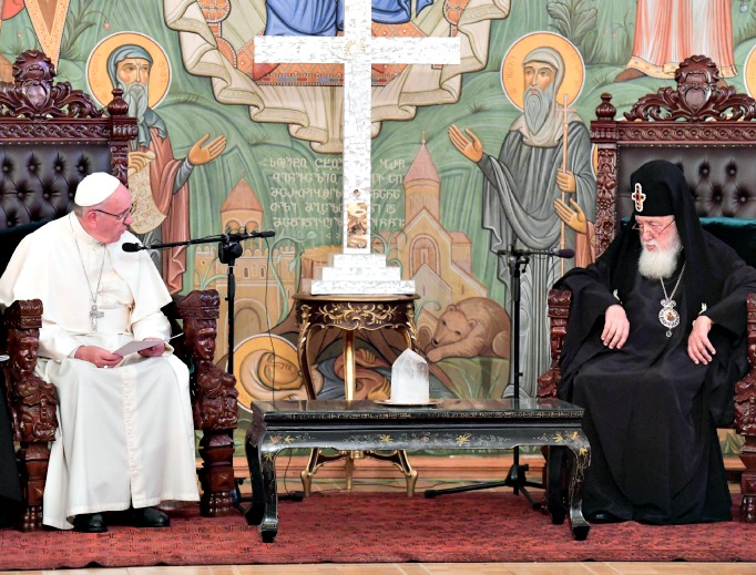 Pope Francis meets with Georgia Orthodox Patriarch Ilia II in Tbilisi, Georgia, Sept. 30, during his papal visit to the country. Pope Francis meets with Georgia Orthodox Patriarch Ilia II in Tbilisi, Georgia, Sept. 30, during his papal visit to the country.