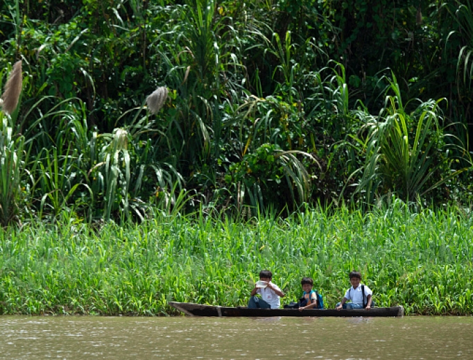Children go to school by canoe on the Maranon River, a main tributary of the Amazon River in the Pacaya Samiria National Reserve, on May 24. The upcoming Pan-Amazonian synod will address issues of importance to the Church in the Amazon region. Children go to school by canoe on the Maranon River, a main tributary of the Amazon River in the Pacaya Samiria National Reserve, on May 24. The upcoming Pan-Amazonian synod will address issues of importance to the Church in the Amazon region.
