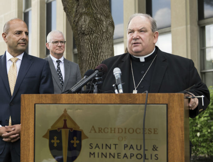 Archbishop Bernard Hebda speaks during a news conference regarding the settlement with the Archdiocese of Saint Paul and Minneapolis outside the Archdiocese Offices in St. Paul, Minnesota, May 31. The archdiocese has agreed to a $210 million settlement with 450 victims of clergy sexual abuse as part of its plan for bankruptcy reorganization. Archbishop Bernard Hebda speaks during a news conference regarding the settlement with the Archdiocese of Saint Paul and Minneapolis outside the Archdiocese Offices in St. Paul, Minnesota, May 31. The archdiocese has agreed to a $210 million settlement with 450 victims of clergy sexual abuse as part of its plan for bankruptcy reorganization.