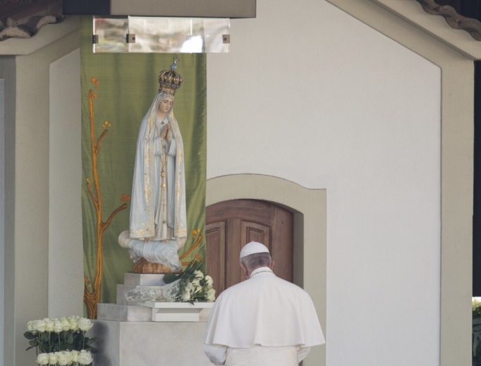 Pope Francis prays at the Shrine of Our Lady of Fatima May 12. Pope Francis prays at the Shrine of Our Lady of Fatima May 12.