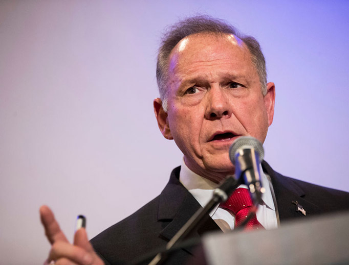 Republican candidate for U.S. Senate Judge Roy Moore speaks during a news conference with supporters and faith leaders, Nov. 16, 2017 in Birmingham, Alabama. Moore refused to answer questions regarding sexual harassment allegations and pursuing relationships with underage women.
Republican candidate for U.S. Senate Judge Roy Moore speaks during a news conference with supporters and faith leaders, Nov. 16, 2017 in Birmingham, Alabama. Moore refused to answer questions regarding sexual harassment allegations and pursuing relationships with underage women.