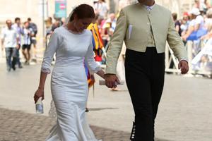 A newlywed couple walk to receive a blessing from Pope Francis at the Wednesday general audience in St. Peter’s Square on June 15. A newlywed couple walk to receive a blessing from Pope Francis at the Wednesday general audience in St. Peter’s Square on June 15.