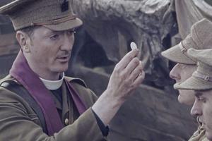 Above, Father Willie Doyle (portrayed by Brian Milligan) distributes Communion to soldiers on the battlefield in Bravery Under Fire Above, Father Willie Doyle (portrayed by Brian Milligan) distributes Communion to soldiers on the battlefield in Bravery Under Fire