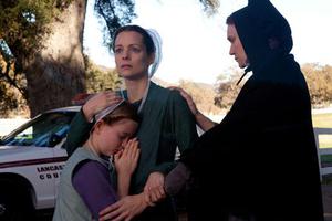 PAIN AND HEALING. 'God has shattered my heart,' says Kimberly Williams-Paisley's character, a bereaved mother, in 'Amish Grace.' PAIN AND HEALING. 'God has shattered my heart,' says Kimberly Williams-Paisley's character, a bereaved mother, in 'Amish Grace.'