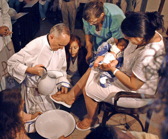 The future Pope Francis washes the feet of a unidentified woman on Holy Thursday at the Buenos Aires' Sarda maternity hospital on March 24, 2005. The future Pope Francis washes the feet of a unidentified woman on Holy Thursday at the Buenos Aires' Sarda maternity hospital on March 24, 2005.