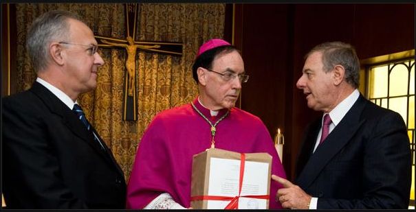 Supreme Knight Carl Anderson (left) with Archbishop Henry Mansell of Hartford, Conn., and Dr. Andrea Ambrosi, postulator of the cause for canonization of Father McGivney. Supreme Knight Carl Anderson (left) with Archbishop Henry Mansell of Hartford, Conn., and Dr. Andrea Ambrosi, postulator of the cause for canonization of Father McGivney.