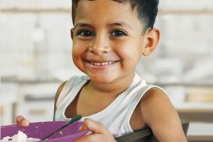 Above, Cross Catholic Outreach provides meals around the world and continues to do so amid the pandemic Above, Cross Catholic Outreach provides meals around the world and continues to do so amid the pandemic