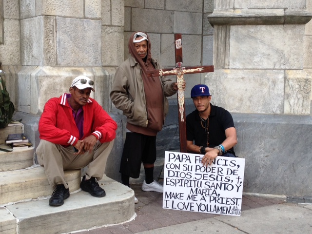 Mauro Avila (holding crucifix) and friends Mauro Avila (holding crucifix) and friends