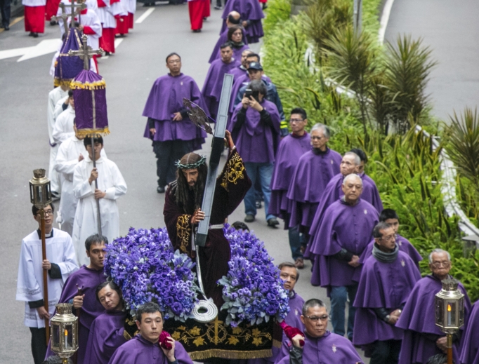 Hundreds of Catholics take part in a solemn procession of the Way of the Cross in Macau, China, March 10. The procession began at the cathedral and finished at St. Augustine’s Church. Hundreds of Catholics take part in a solemn procession of the Way of the Cross in Macau, China, March 10. The procession began at the cathedral and finished at St. Augustine’s Church.