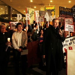 Cardinal Roger Mahony of Los Angeles speaks with supporters of the DREAM Act at the start of a Dec. 7 procession in downtown Los Angeles to Our Lady Queen of the Angels Church as part of a national candlelight vigil. The Development, Relief and Education for Alien Minors Act would provide a chance for legal status and eventual citizenship for young people who were brought into the United States illegally as children and educated here or who serve in the military here. Cardinal Roger Mahony of Los Angeles speaks with supporters of the DREAM Act at the start of a Dec. 7 procession in downtown Los Angeles to Our Lady Queen of the Angels Church as part of a national candlelight vigil. The Development, Relief and Education for Alien Minors Act would provide a chance for legal status and eventual citizenship for young people who were brought into the United States illegally as children and educated here or who serve in the military here.
