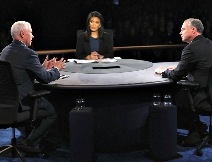Republican vice-presidential nominee Mike Pence (l) and Democratic vice-presidential nominee Tim Kaine debate as moderator Elaine Quijano listens during the Vice-Presidential Debate at Longwood University on Oct. 4 in Farmville, Virginia. Republican vice-presidential nominee Mike Pence (l) and Democratic vice-presidential nominee Tim Kaine debate as moderator Elaine Quijano listens during the Vice-Presidential Debate at Longwood University on Oct. 4 in Farmville, Virginia.