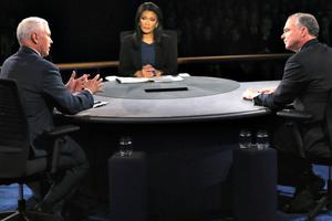 Republican vice-presidential nominee Mike Pence (l) and Democratic vice-presidential nominee Tim Kaine debate as moderator Elaine Quijano listens during the Vice-Presidential Debate at Longwood University on Oct. 4 in Farmville, Virginia. Republican vice-presidential nominee Mike Pence (l) and Democratic vice-presidential nominee Tim Kaine debate as moderator Elaine Quijano listens during the Vice-Presidential Debate at Longwood University on Oct. 4 in Farmville, Virginia.