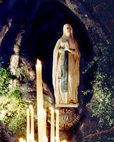 A statue of Mary in the grotto at Lourdes. A statue of Mary in the grotto at Lourdes.