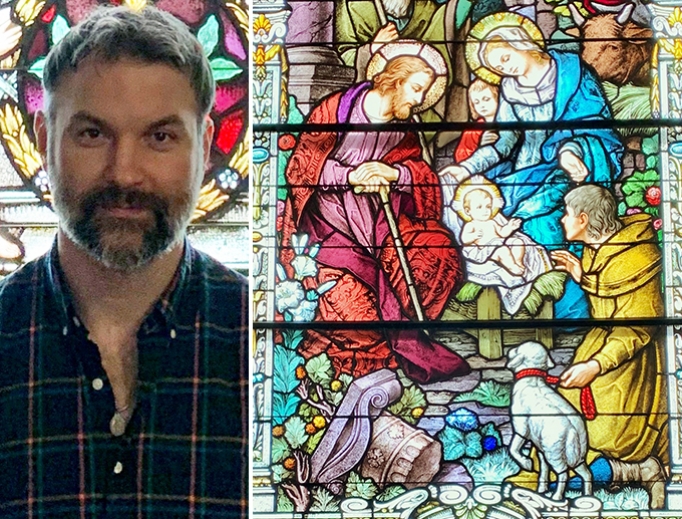 John Scott stands in front of a large stained-glass window at historic Holy Rosary Church in Cedar, Michigan. The right half of the image shows more of the same window. John Scott stands in front of a large stained-glass window at historic Holy Rosary Church in Cedar, Michigan. The right half of the image shows more of the same window.