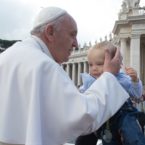 Pope Francis greets a baby at his Oct. 7 Wednesday general audience in St. Peter’s Square. Pope Francis greets a baby at his Oct. 7 Wednesday general audience in St. Peter’s Square.