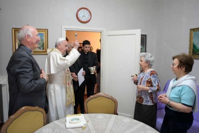 Pope Francis blesses a home in Ostia, Italy, May 19. Pope Francis blesses a home in Ostia, Italy, May 19.