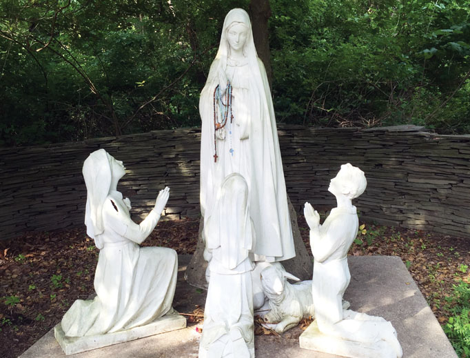 Above, the Asbury, New Jersey, shrine highlights Marian devotion in a serene setting, including a statue scene of the seers and Our Lady. Below, the Holliston, Massachusetts, shrine celebrates the Blessed Mother among nature’s beauty. Above, the Asbury, New Jersey, shrine highlights Marian devotion in a serene setting, including a statue scene of the seers and Our Lady. Below, the Holliston, Massachusetts, shrine celebrates the Blessed Mother among nature’s beauty.