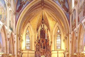 In this photograph of the sanctuary of St. John’s in Orange, NJ, you can see both of the images I refer to in my homily: the painting of Christ glorified in heaven over the arch (the subject is the coronation of the Blessed Virgin) and the large crucifixion scene behind the ambo. (In my homily I say the crucifixion is on my right. That’s because this is an older photograph; the ambo has been moved and the stairs retired. Other than that and some water damage to the ceiling, the church looks pretty much the same.) In this photograph of the sanctuary of St. John’s in Orange, NJ, you can see both of the images I refer to in my homily: the painting of Christ glorified in heaven over the arch (the subject is the coronation of the Blessed Virgin) and the large crucifixion scene behind the ambo. (In my homily I say the crucifixion is on my right. That’s because this is an older photograph; the ambo has been moved and the stairs retired. Other than that and some water damage to the ceiling, the church looks pretty much the same.)