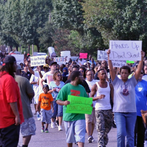Protest march in Ferguson, Mo., following the August death of Michael Brown, who was fatally shot during a confrontation with Ferguson police officer Darren Wilson. Protest march in Ferguson, Mo., following the August death of Michael Brown, who was fatally shot during a confrontation with Ferguson police officer Darren Wilson.