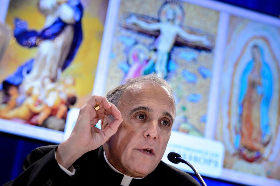 Galveston-Houston Cardinal Daniel DiNardo, president of the USCCB, speaks during a Nov. 12 press conference at the annual U.S. Conference of Catholic Bishops fall meeting in Baltimore, Maryland. Galveston-Houston Cardinal Daniel DiNardo, president of the USCCB, speaks during a Nov. 12 press conference at the annual U.S. Conference of Catholic Bishops fall meeting in Baltimore, Maryland.