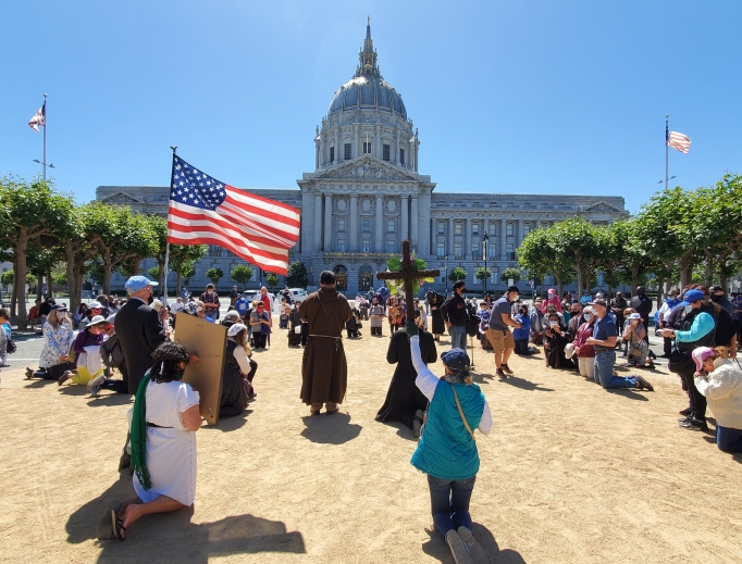 Catholic priests and the faithful gather in prayerful protest in front of San Francisco's City Hall July 5. Catholic priests and the faithful gather in prayerful protest in front of San Francisco's City Hall July 5.