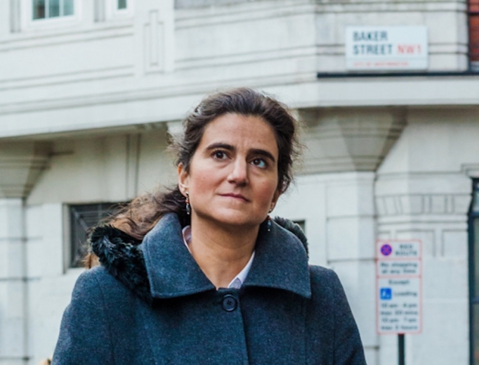 Author Fiorella de Maria walks along Baker Street. Author Fiorella de Maria walks along Baker Street.