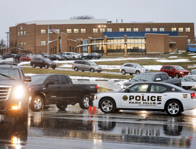 Students arrive Jan. 23 at Covington Catholic High School in Park Hills, Kentucky, as classes resume following a closing due to security concerns the previous day. Local police authorities controlled access to the property at entrances and exits. Students arrive Jan. 23 at Covington Catholic High School in Park Hills, Kentucky, as classes resume following a closing due to security concerns the previous day. Local police authorities controlled access to the property at entrances and exits.
