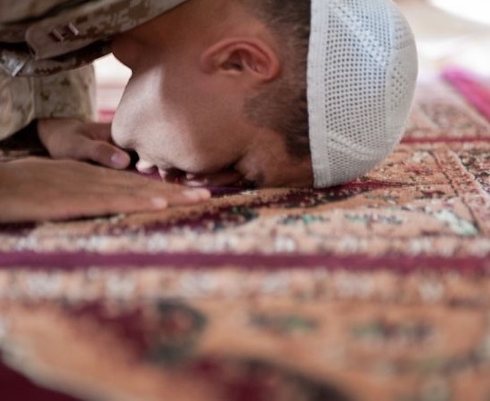 Muslim chaplain prays during the Islamic holy month of Ramadan. Muslim chaplain prays during the Islamic holy month of Ramadan.
